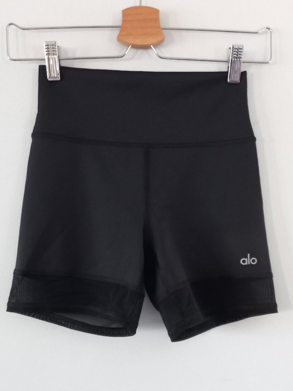 ALO YOGA high waist black shorts with sheer panels at the hems
